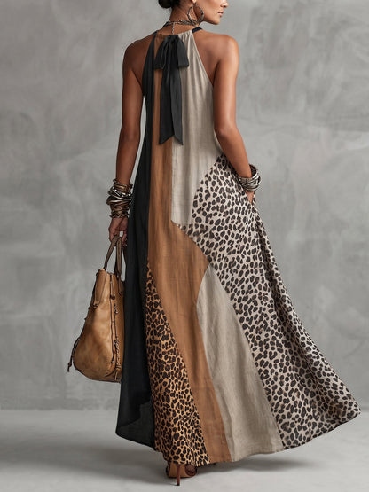 INÈS | Abito Maxi Halter con Stampa Leopardo e Inserti Asimmetrici