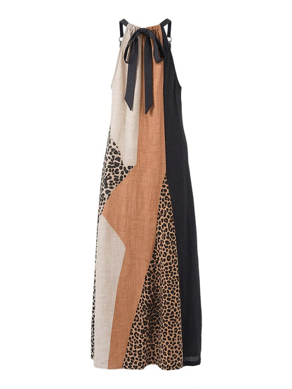 INÈS | Abito Maxi Halter con Stampa Leopardo e Inserti Asimmetrici